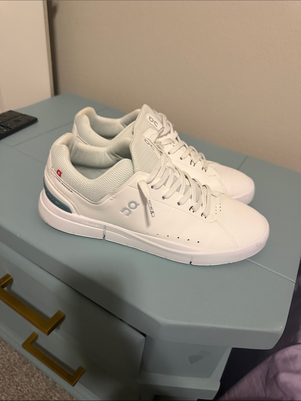 On Running White Men's Casual Sneakers with Teal Accent